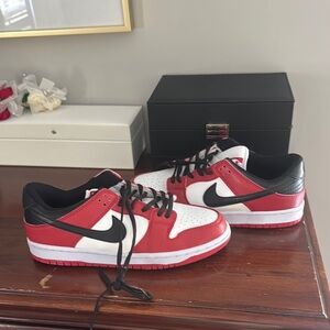 Red and White Low-Top Sneakers with Black Accents